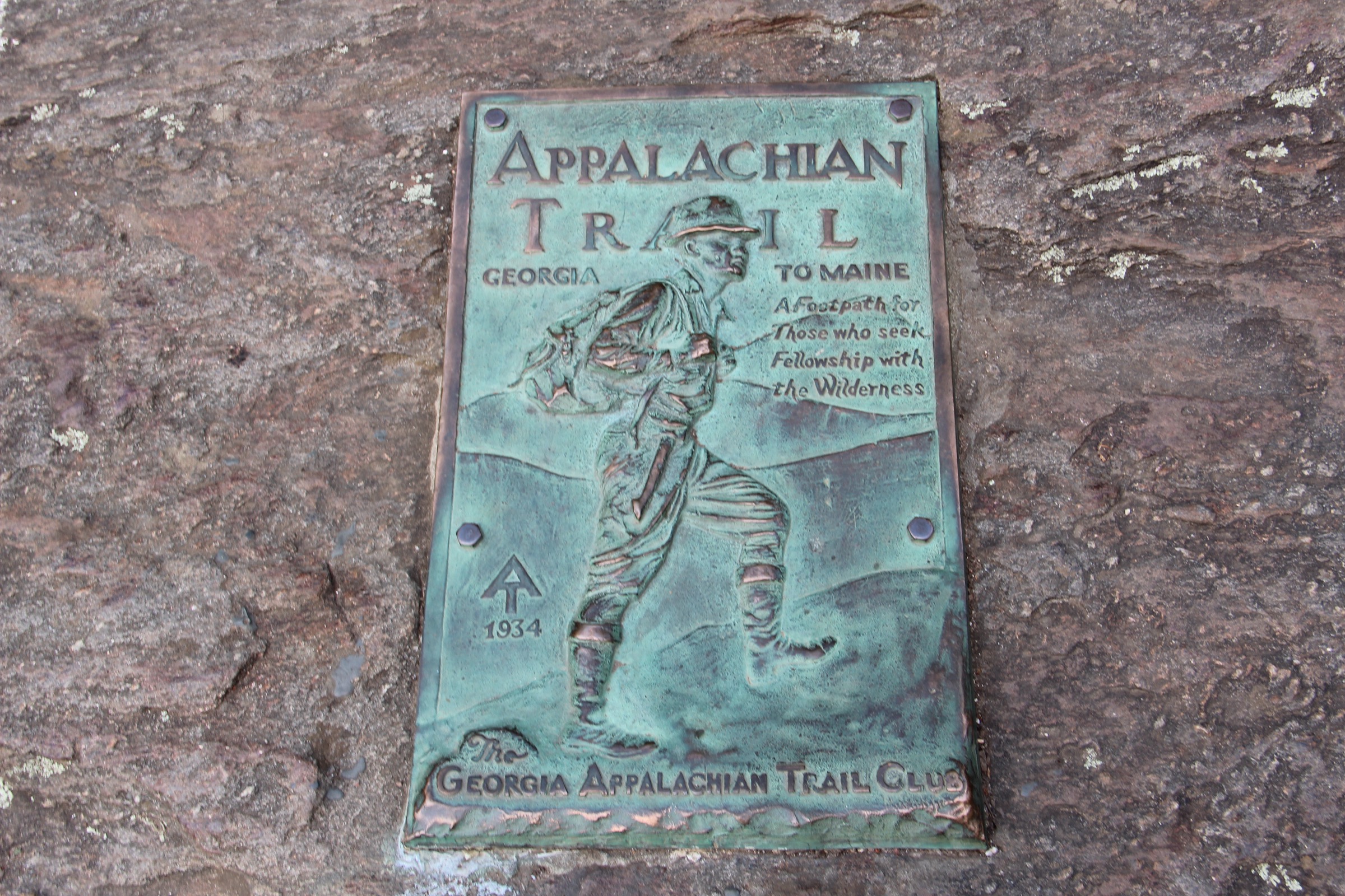 The Appalachian Trail southern terminus plaque on the summit of Springer Mountain, Georgia