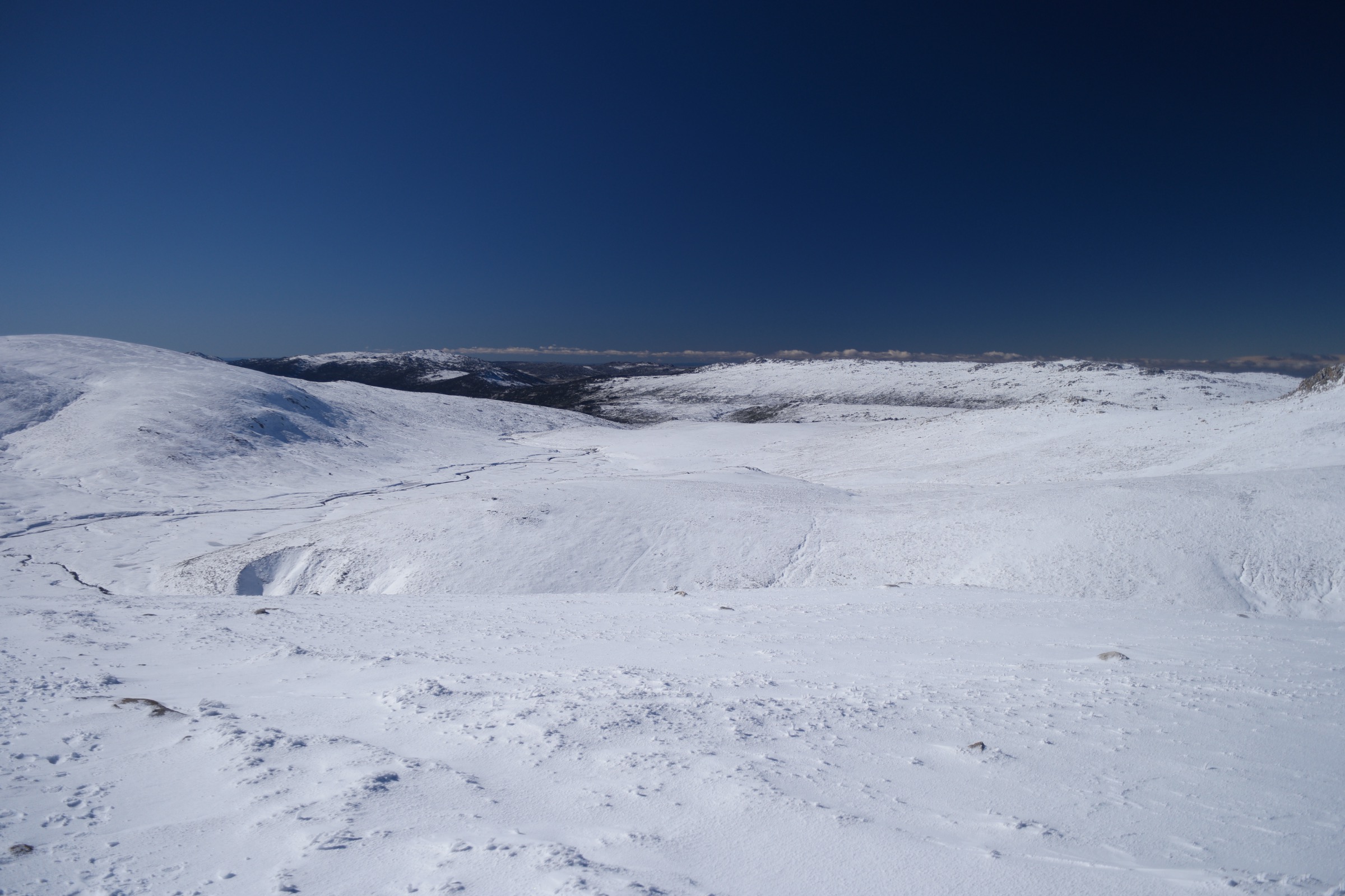 View from the Main Range walk toward Charlotte Pass, Mount Stilwell and Etheridge Ridge, Kosciuszko National Park