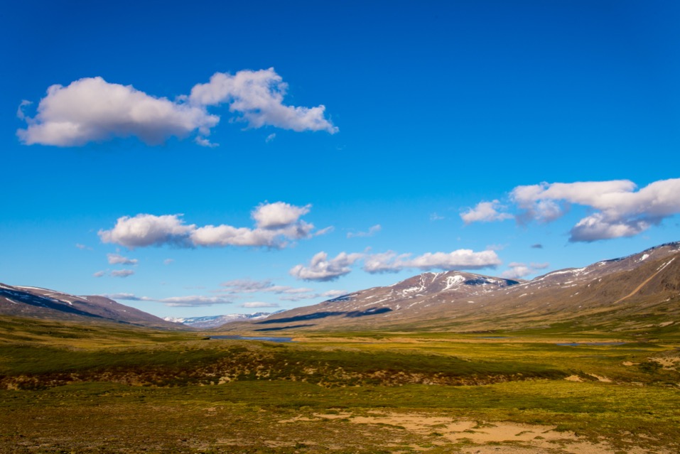 The wide treeless valley floor of the Koroc River