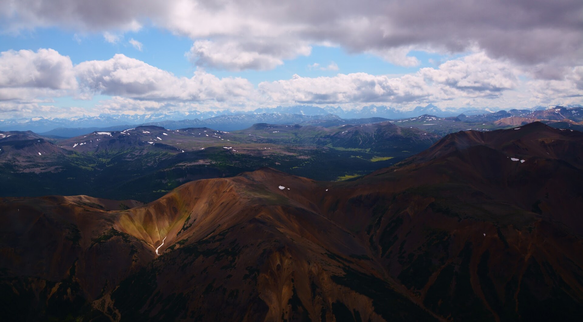 The Rainbow Range from the air, showing colour-banded volcanic slopes in Tweedsmuir South Provincial Park