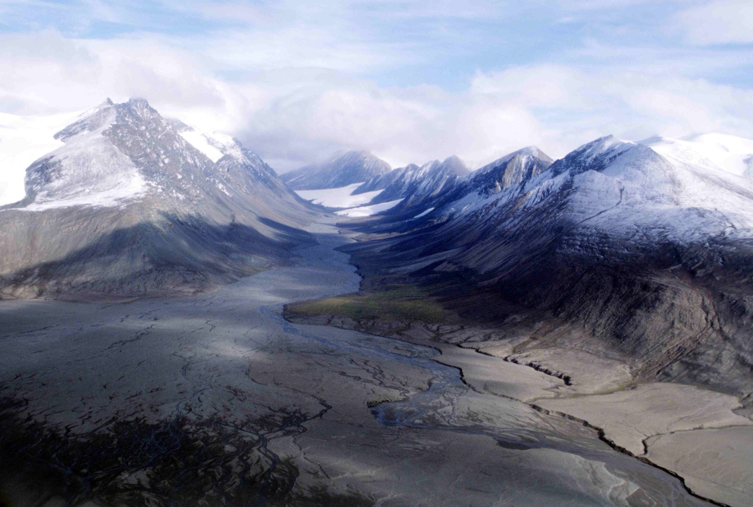 The Air Force Glacier descending toward Tanquary Fiord — the standard south-side approach corridor to Barbeau Peak