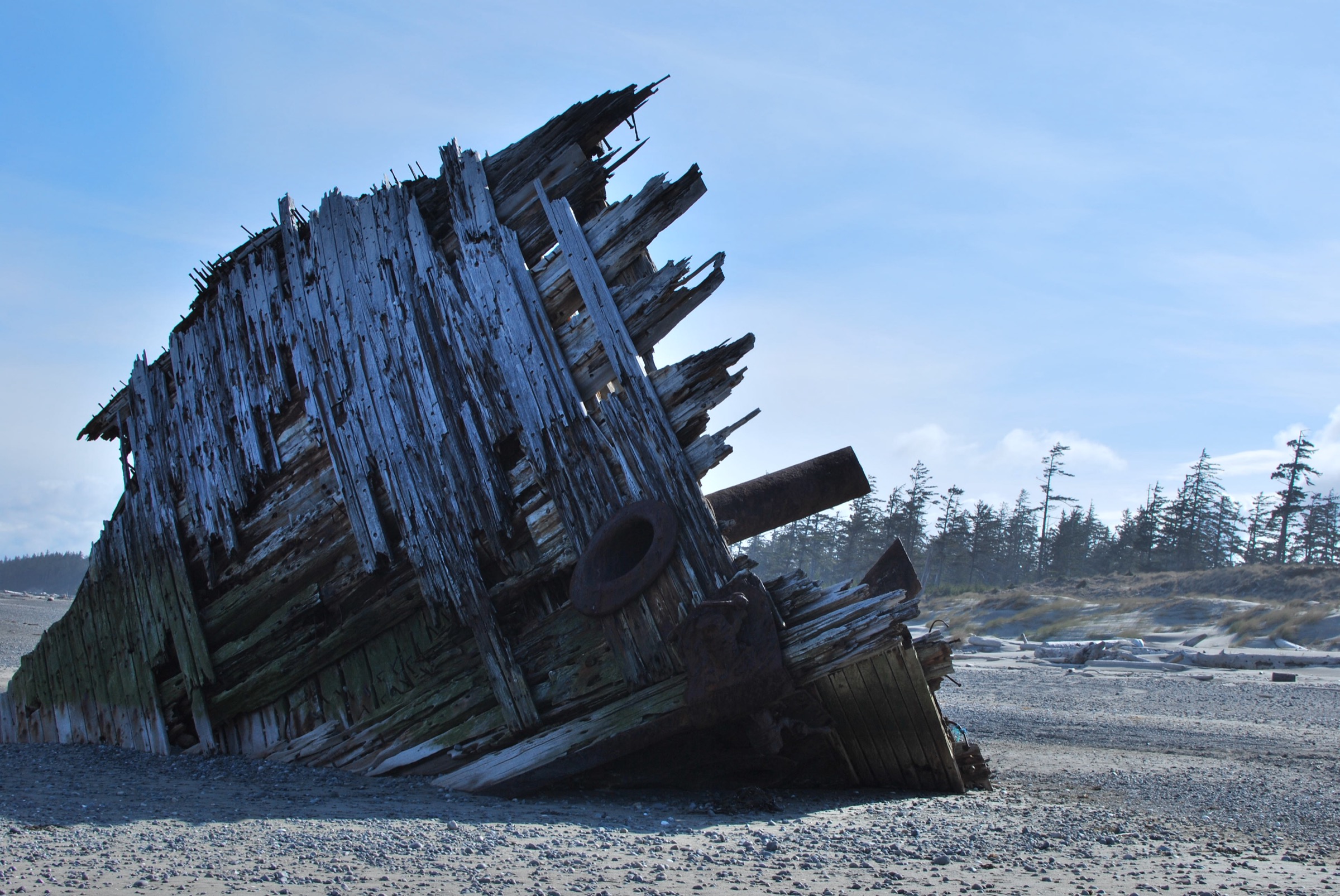 The rusted bow of the log barge Pesuta on East Beach, Naikoon Provincial Park
