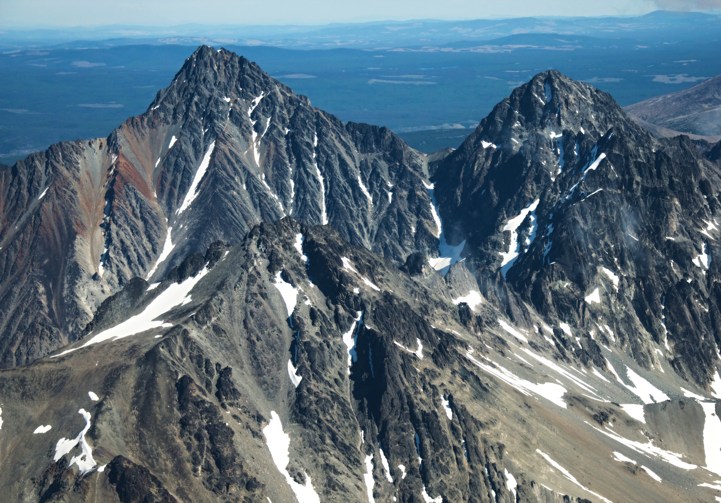 Aerial view of Tŝʼilʔoŝ (Mount Tatlow) above the Chilcotin Plateau, the dominant peak visible from Tullin Mountain