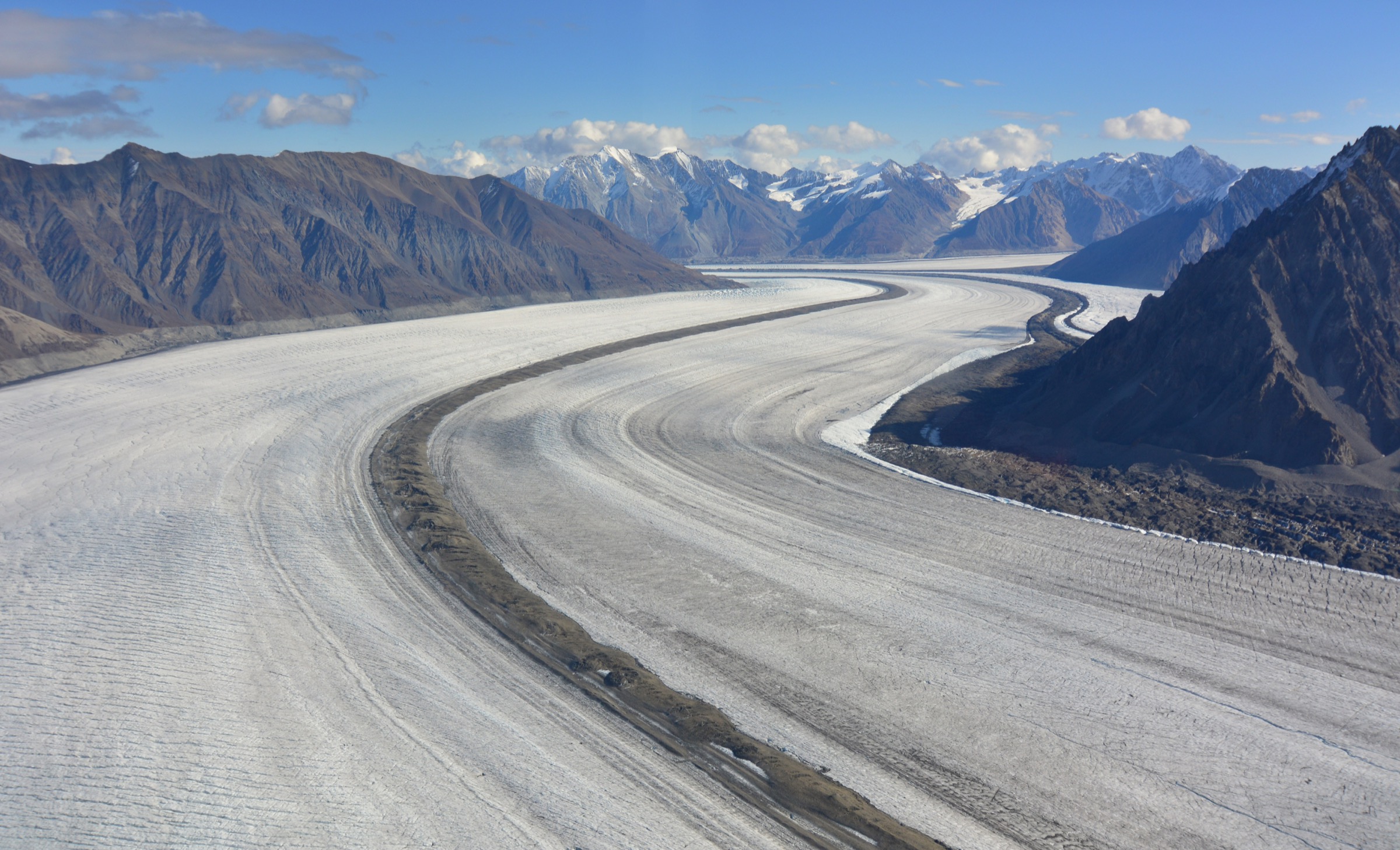 Aerial view of the Kaskawulsh Glacier flowing down from the Icefield Ranges into the Slims and Kaskawulsh river valleys