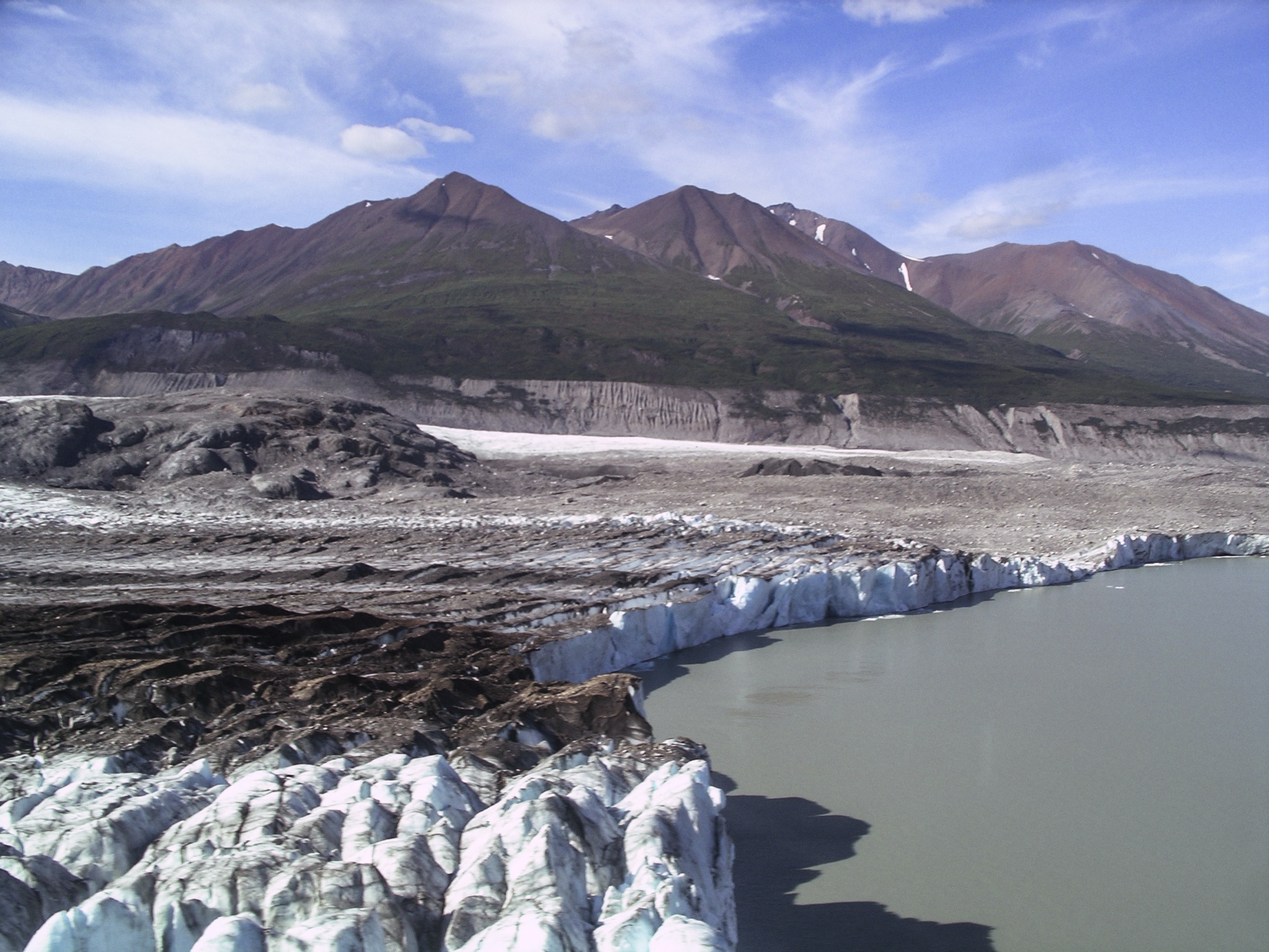 Lowell Glacier calving into Lowell Lake at the foot of Goatherd Mountain, Kluane National Park