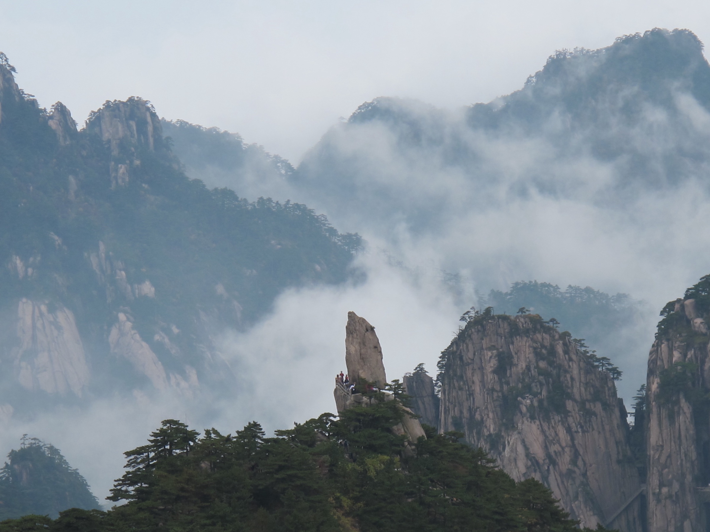 The Flying Rock balanced boulder above a Huangshan cloud sea