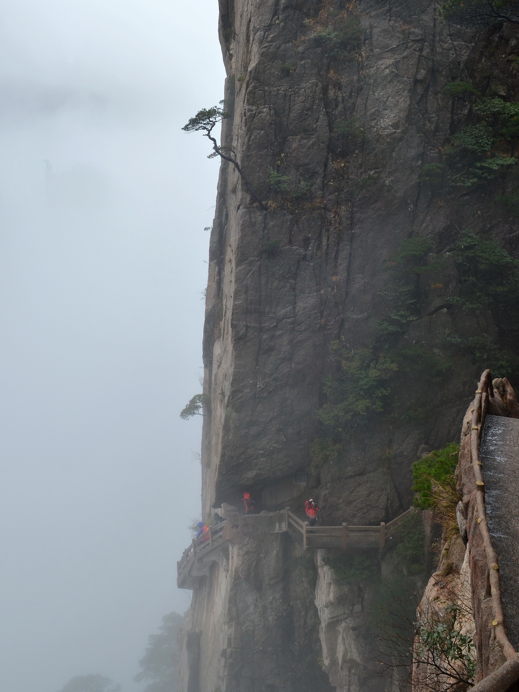 Cliff path and granite spires of the West Sea Grand Canyon on Mount Huangshan