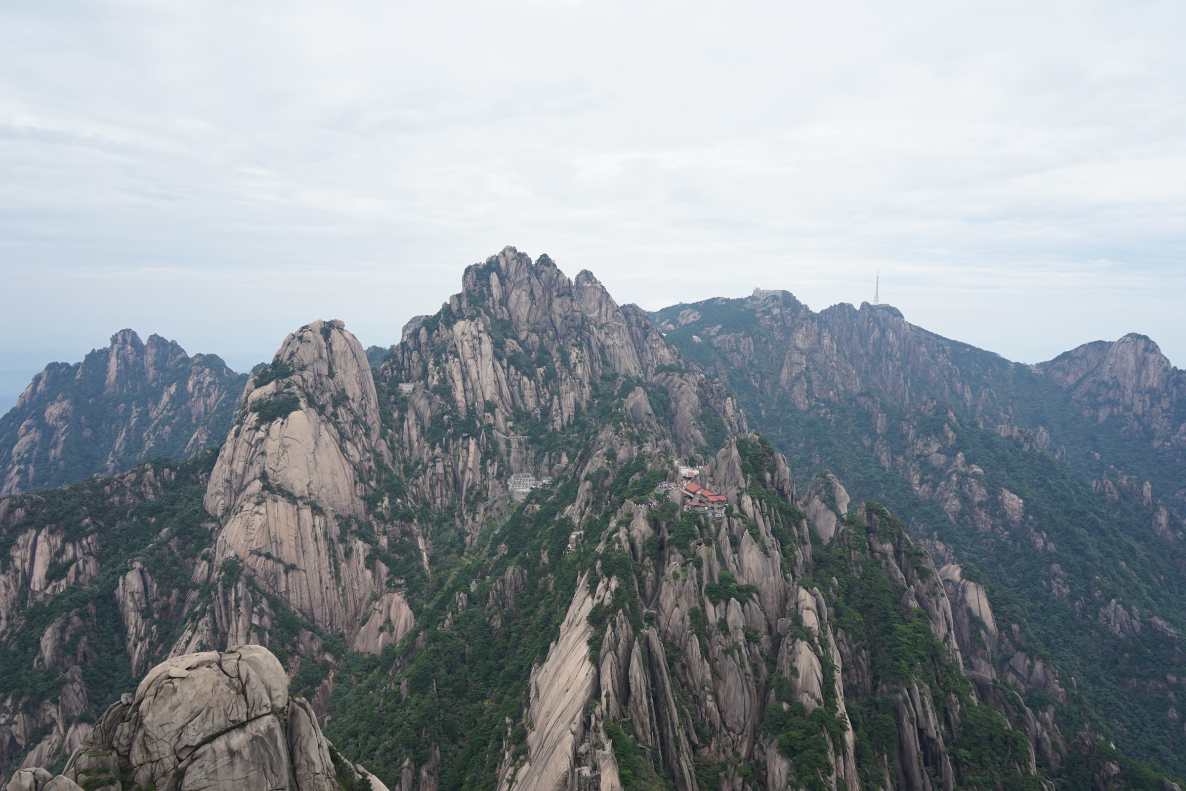 Lotus Peak and Yuping Peak rising out of cloud on the Huangshan high path network