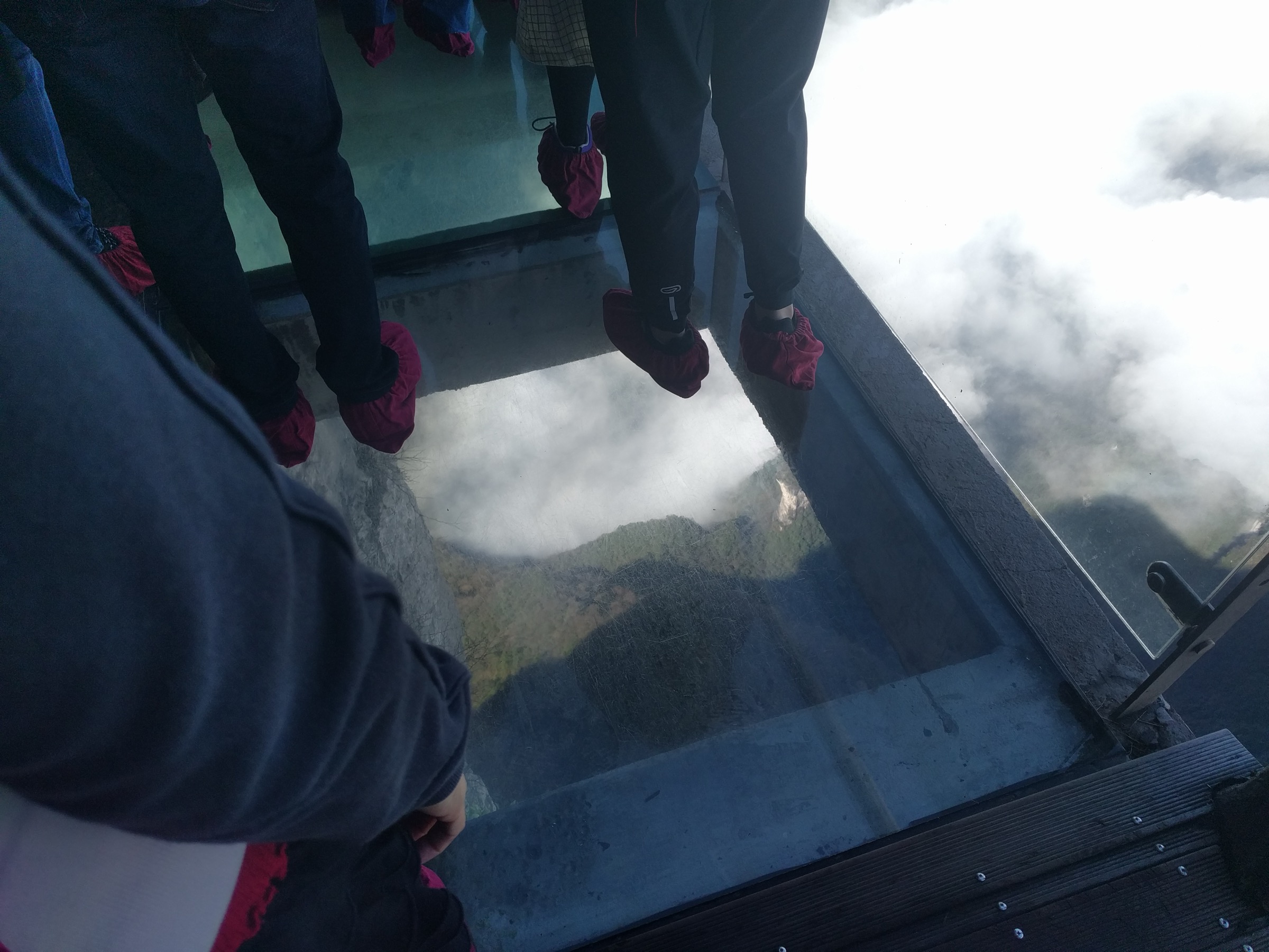 Cliff-edge balcony and glass walkway section on Tianmen Mountain's east summit path