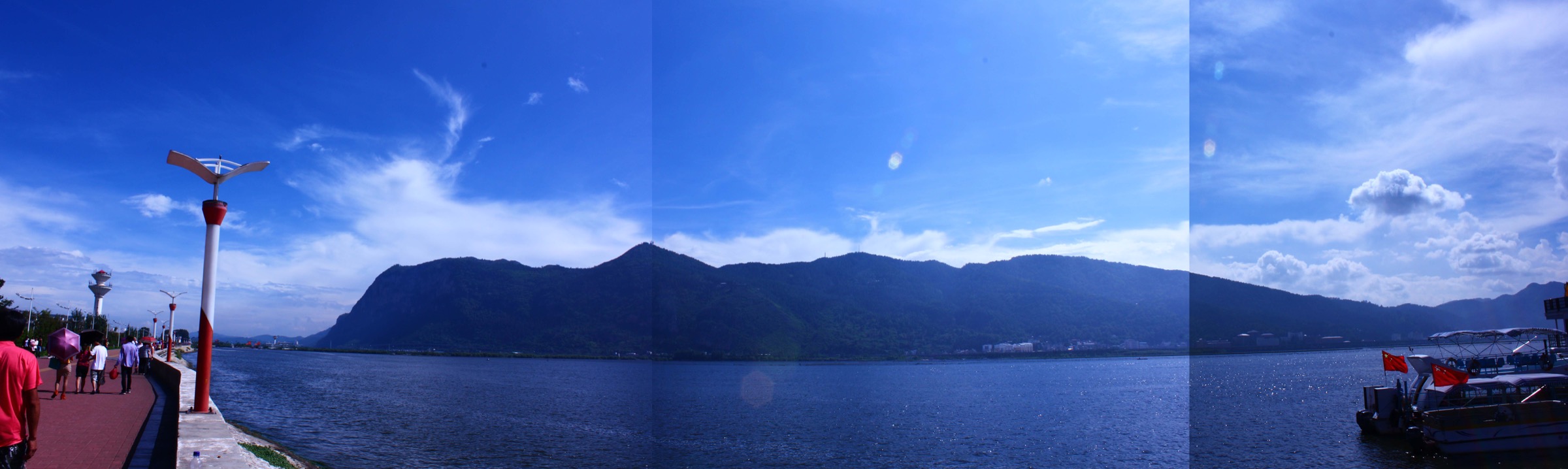 Panorama of Xishan (Western Hills) over Lake Dian from the Caohai Causeway, Kunming
