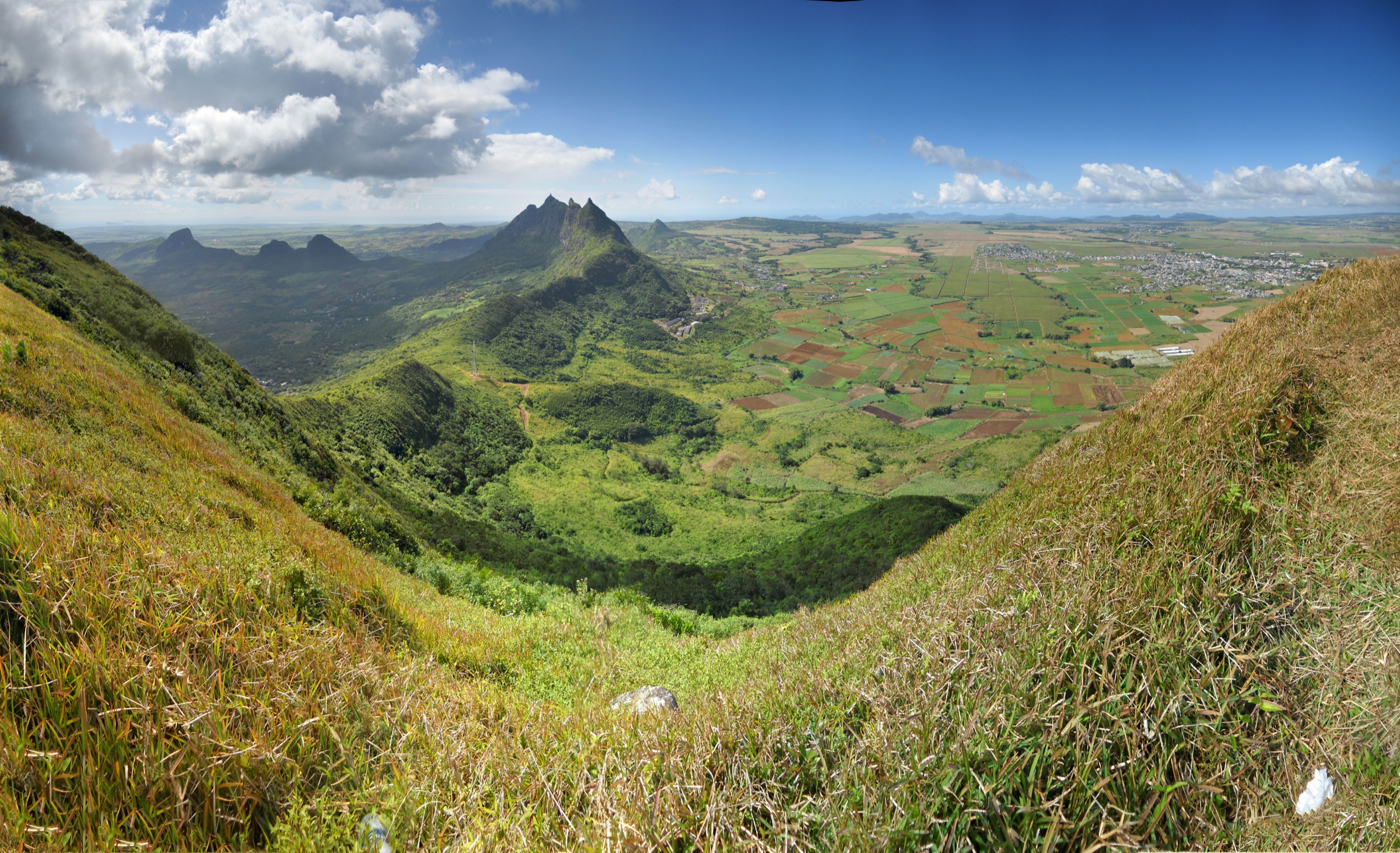 Pieter Both mountain, with its iconic head-shaped boulder at the summit, seen from the southern flank in the Moka Range