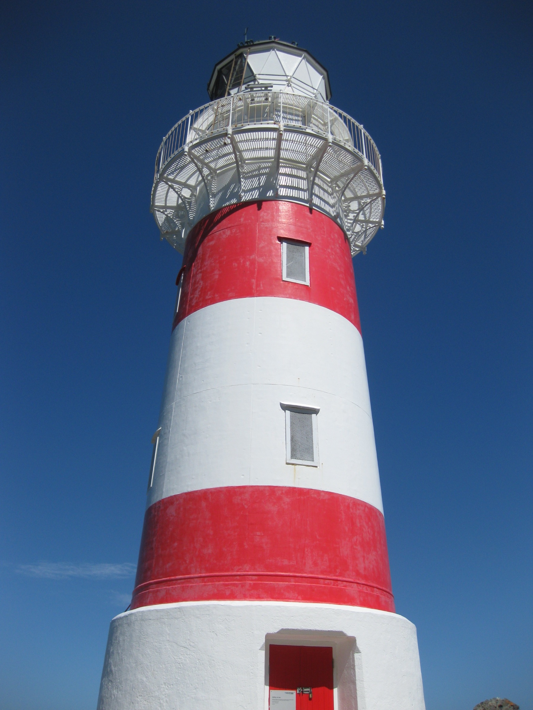 Cape Palliser Lighthouse on the cliff at the southern end of the Aorangi Range, southern Wairarapa