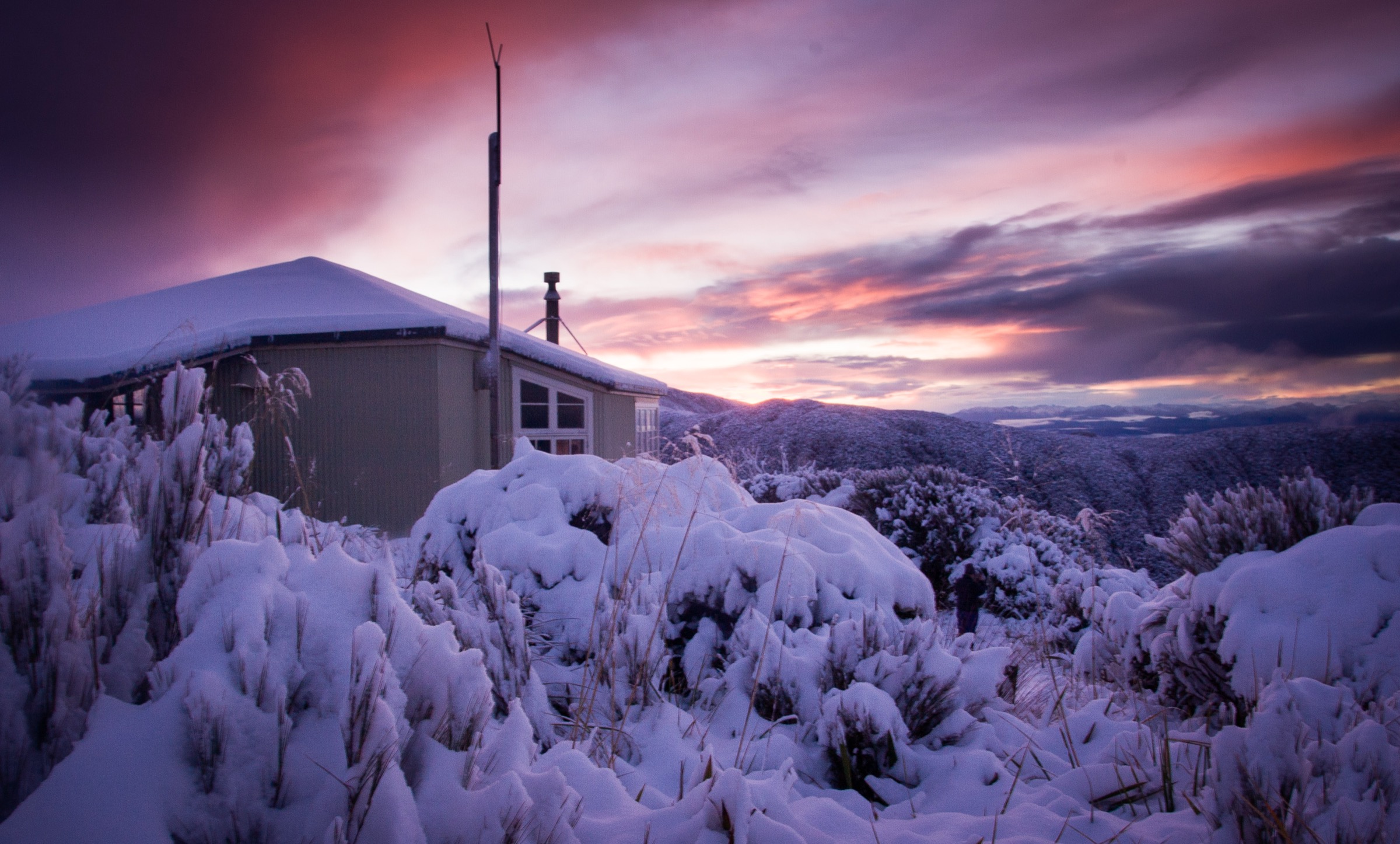 Ces Clark Hut on the Croesus Track, near the bushline on the Paparoa Range