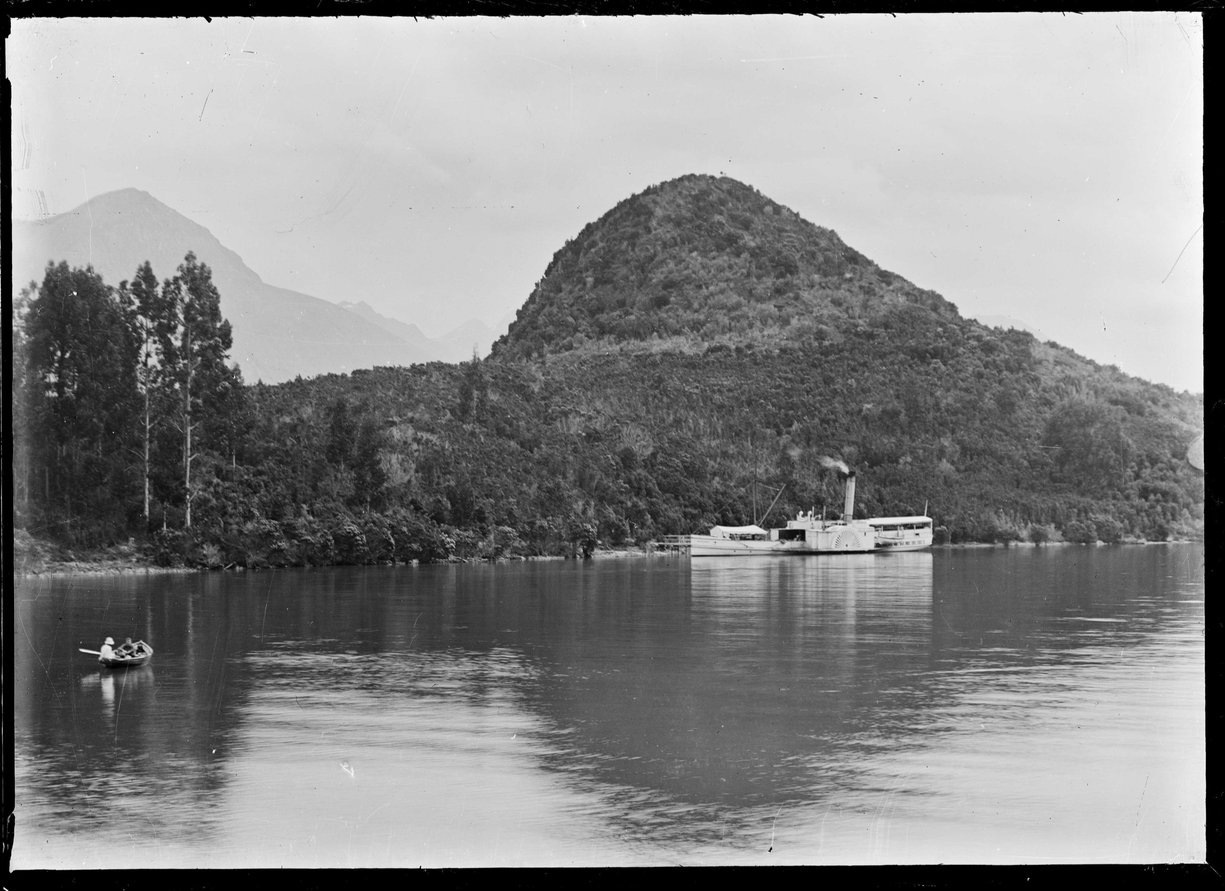 Paddle steamer Mountaineer at the jetty at Bob's Cove, Lake Wakatipu, historic photograph