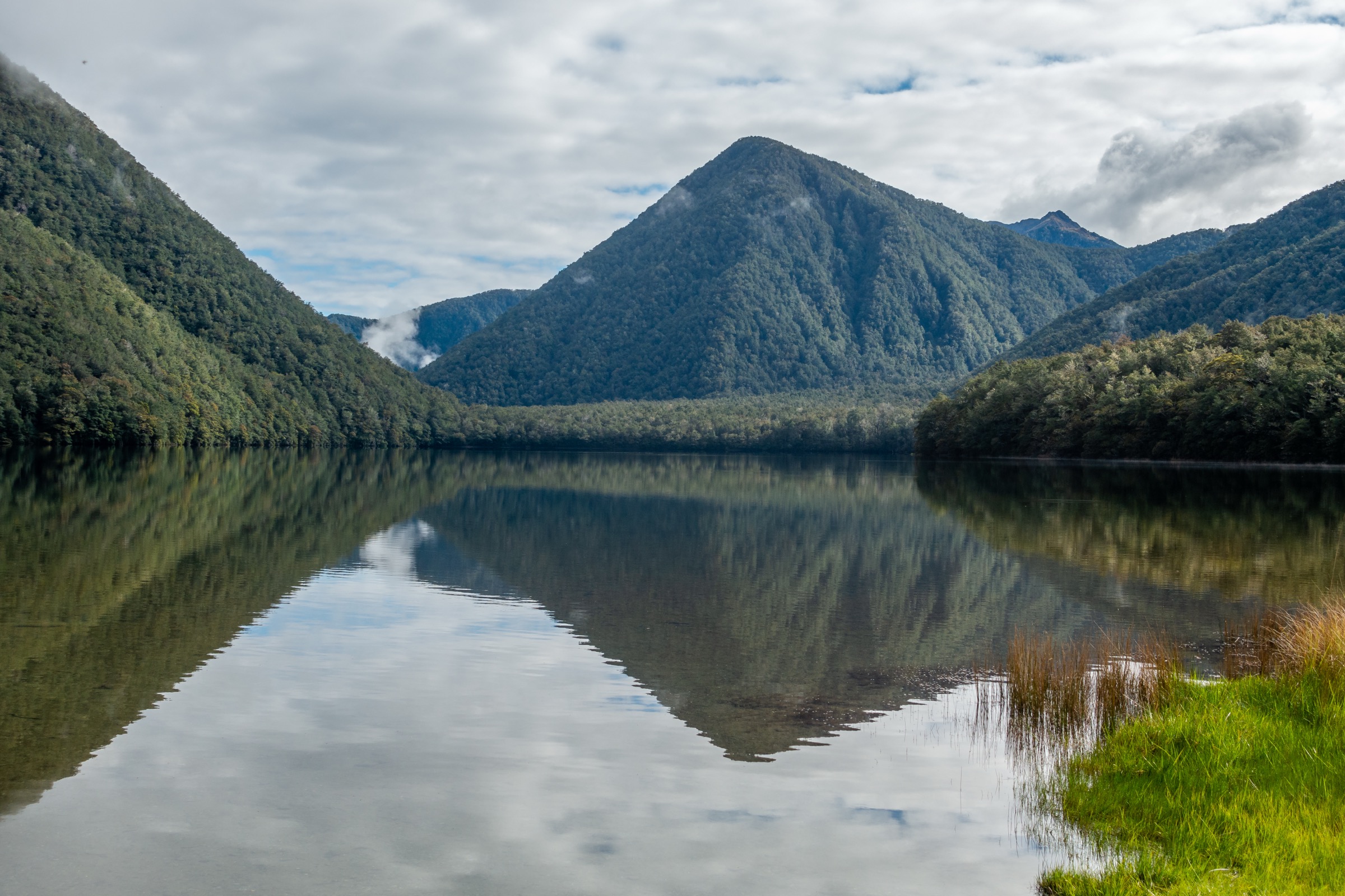 Lake Daniell fringed by red beech forest, Lewis Pass Scenic Reserve, West Coast