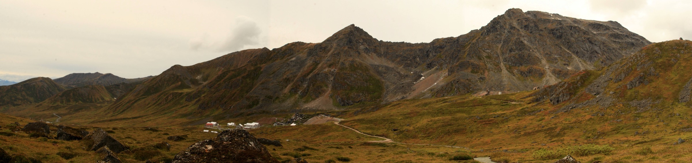 Panorama of the Independence Mine buildings set in the alpine bowl at Hatcher Pass, Alaska