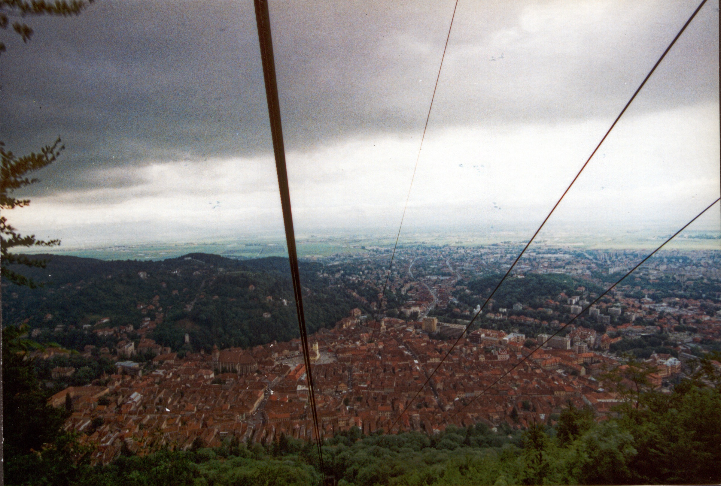 Brașov old town, Council Square and the Black Church seen from Mount Tâmpa above the medieval walls