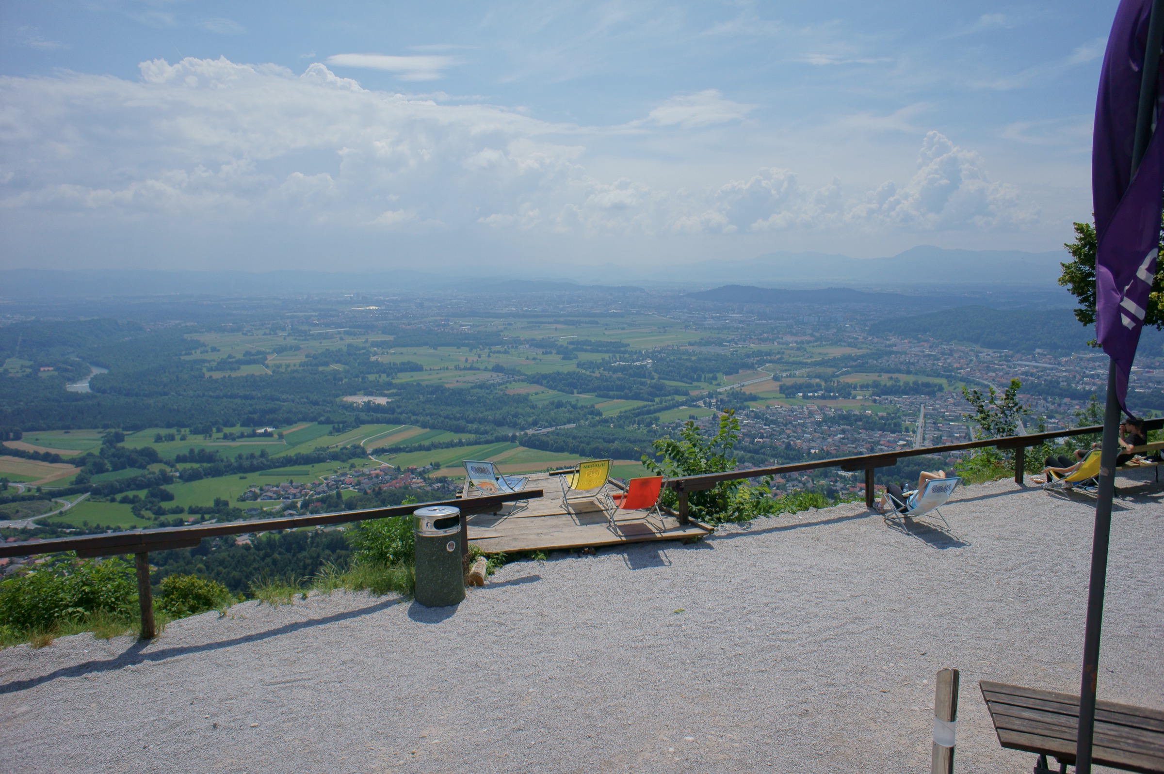 View from Šmarna Gora across the forested foothills towards Ljubljana on the plain below