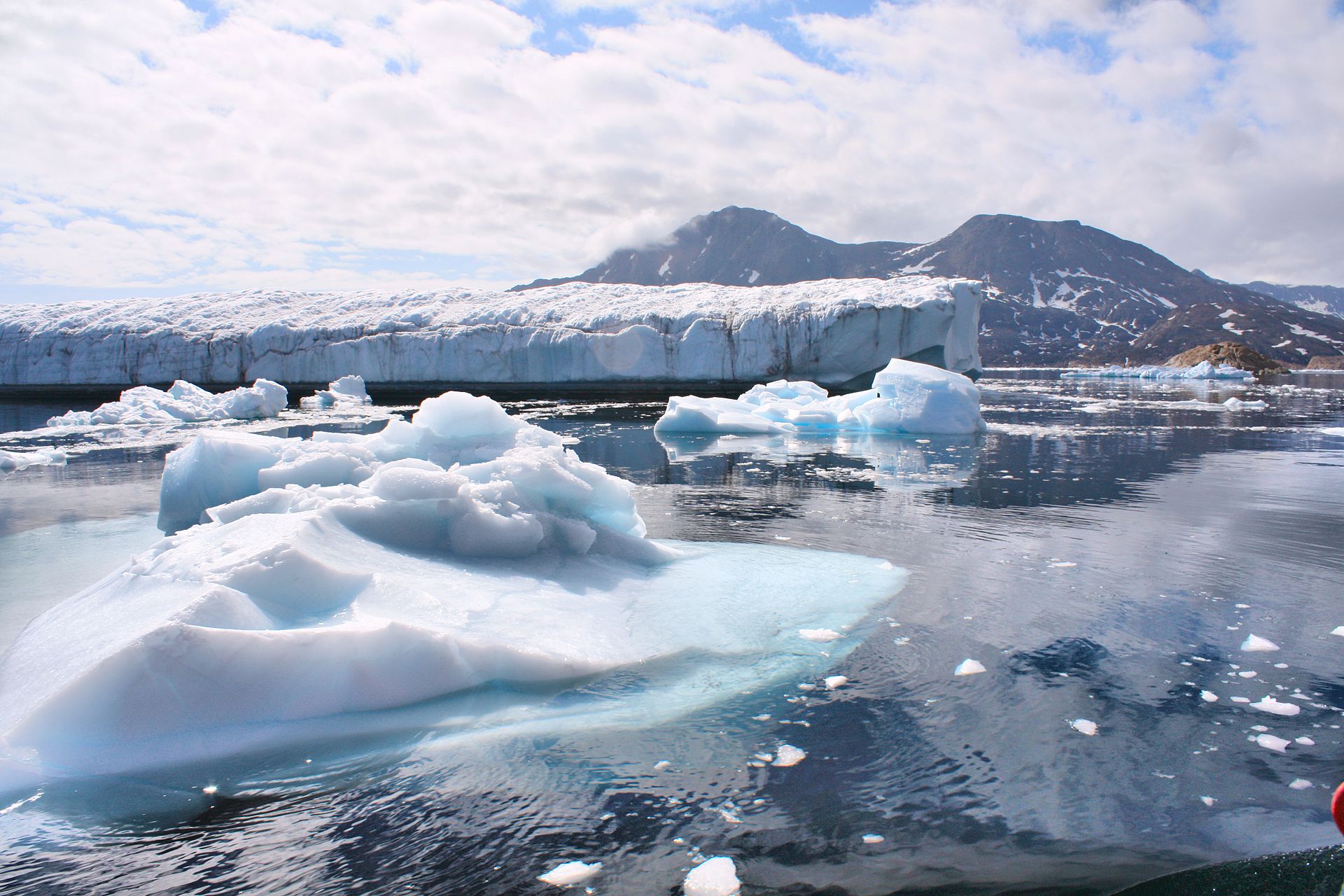 A broad panorama of glaciers and rugged mountains outside Ammassalik