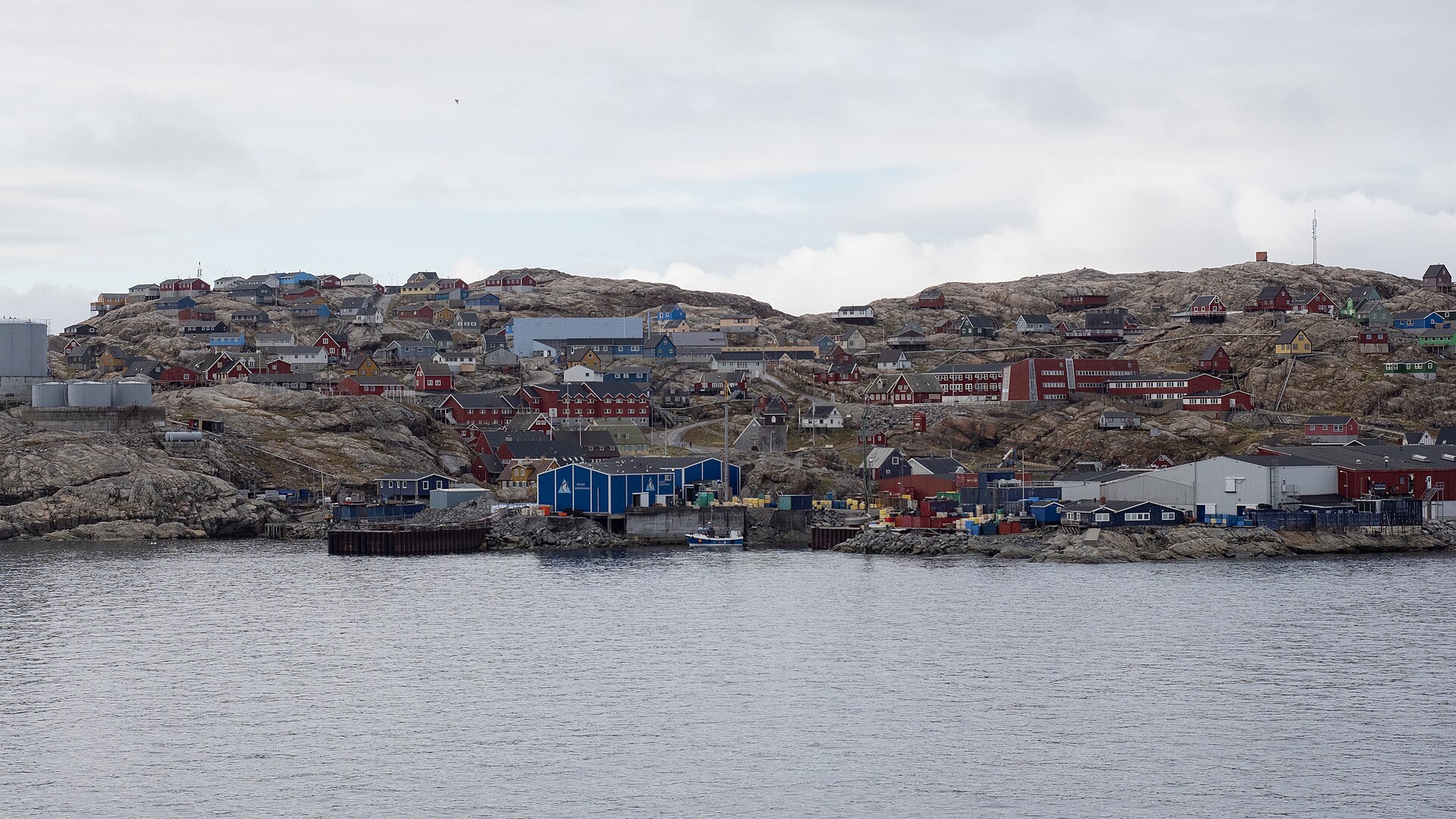 Colourful houses on snowy slopes in Uummannaq, Greenland