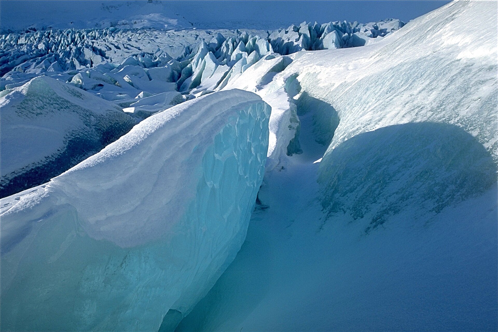 Large blue crevasses splitting the surface of Vatnajökull