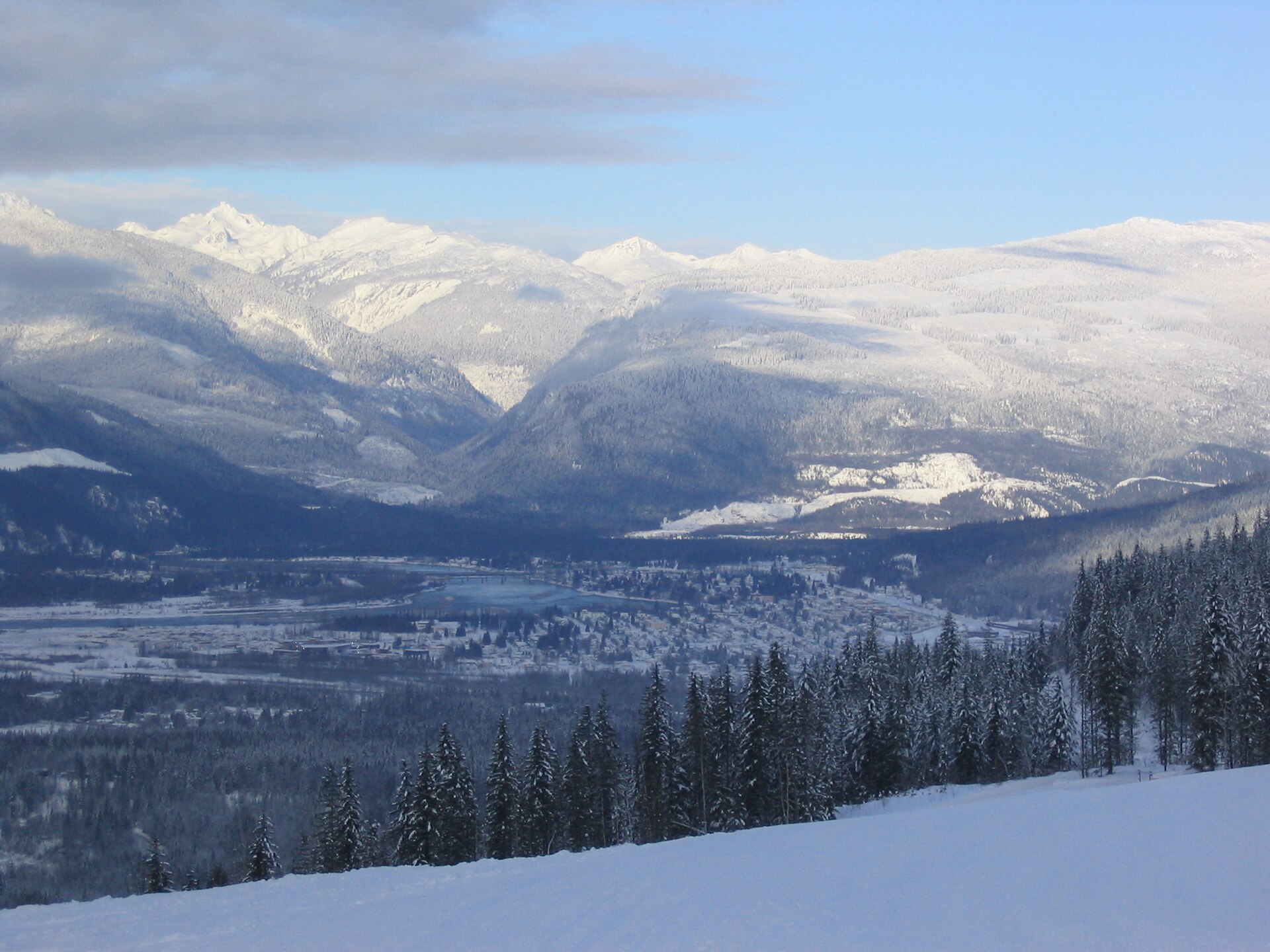Revelstoke and its surrounding mountains covered in winter snow