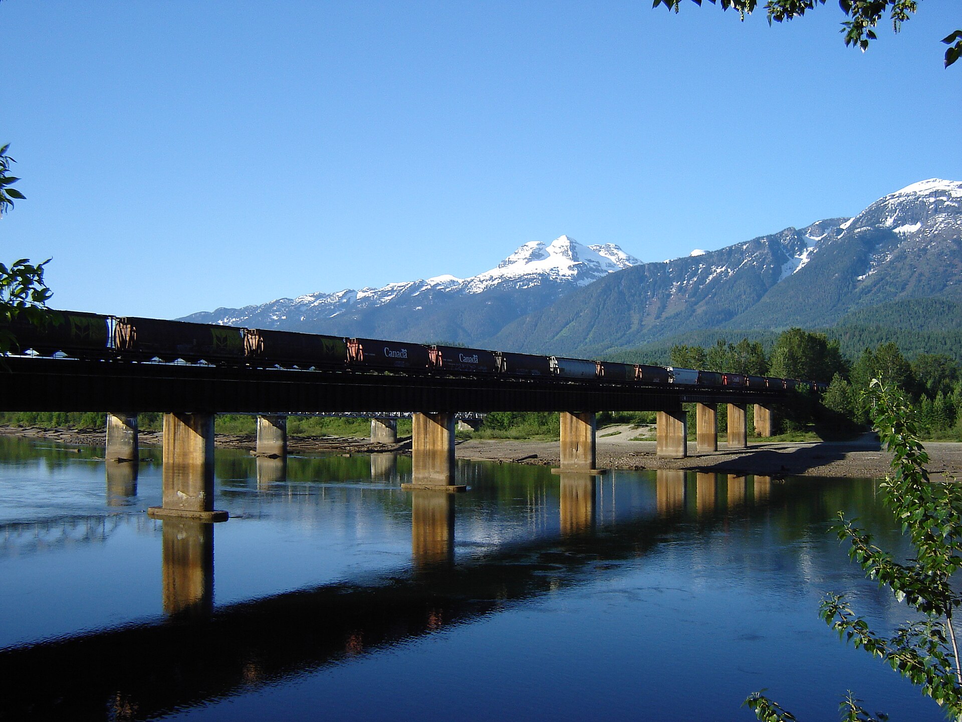 A freight train crossing the Columbia River at Revelstoke
