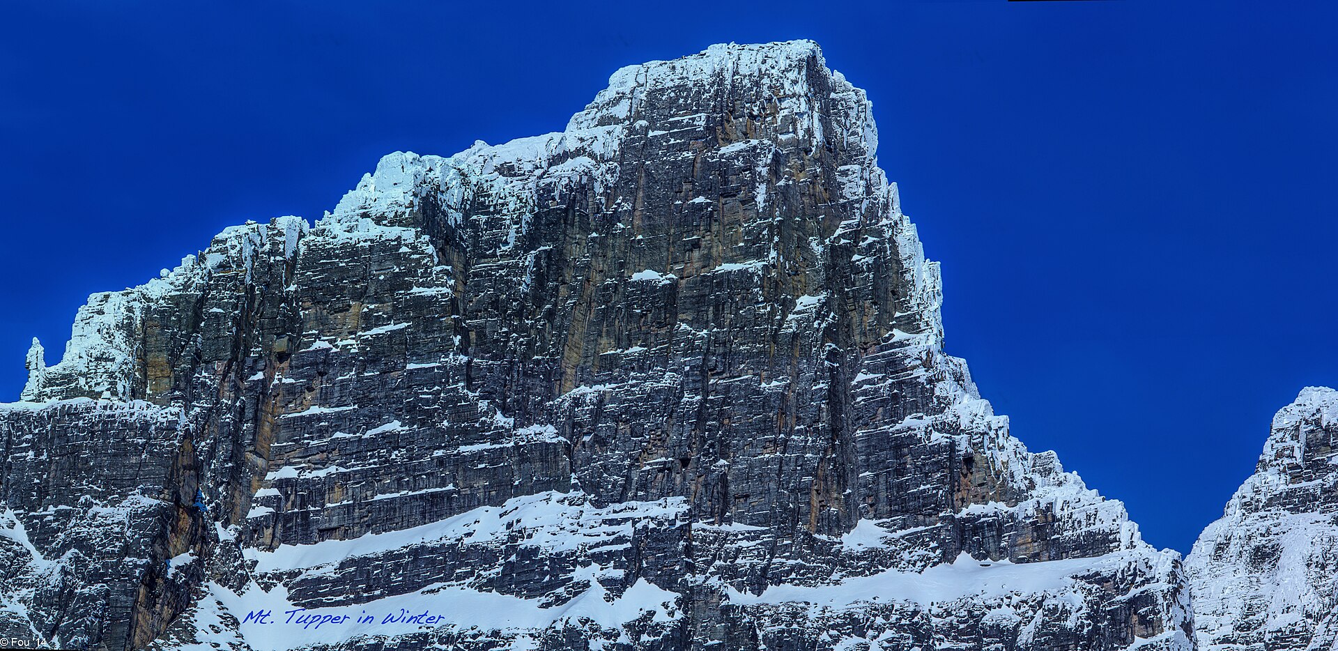 The snow- and rime-covered face of Mount Tupper at Rogers Pass