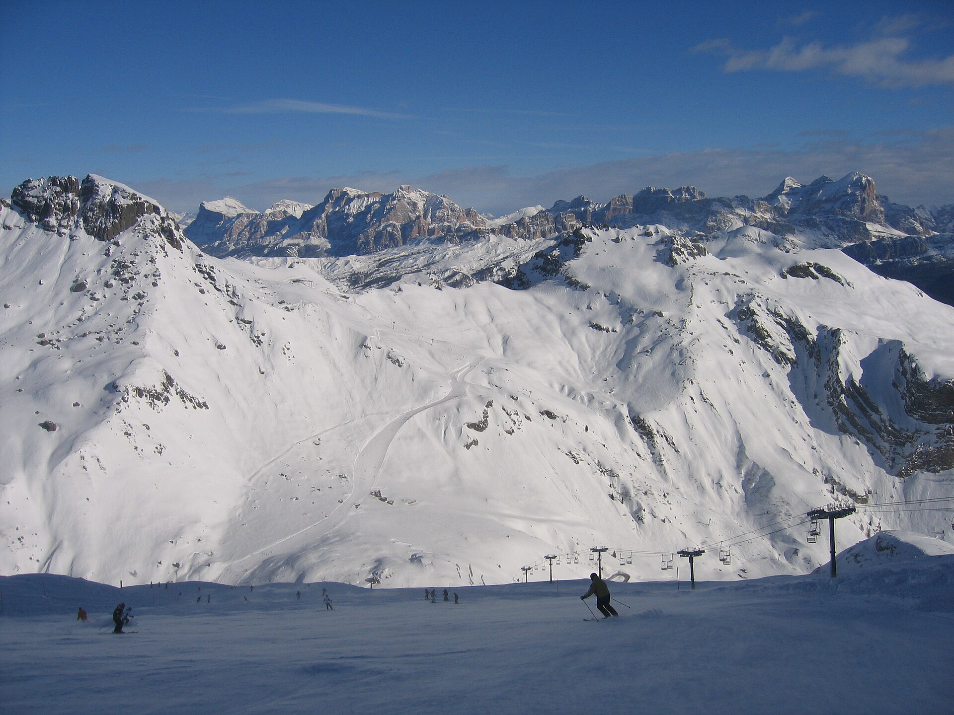 Winter view across snowy Dolomite ranges from Punta Rocca on Marmolada