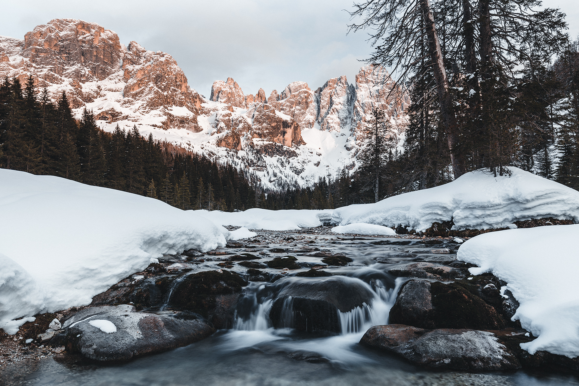 Val Venegia under snow beneath the Pale di San Martino