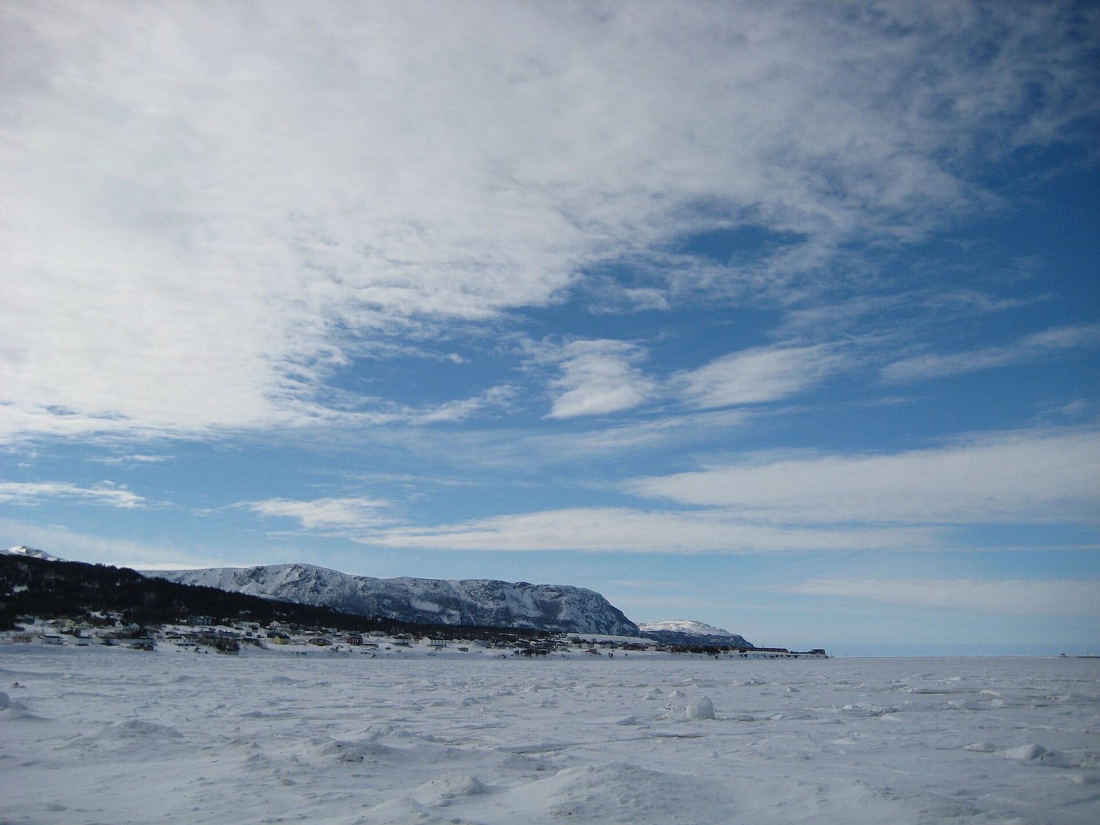 Rocky Harbour Cove surrounded by snow in winter