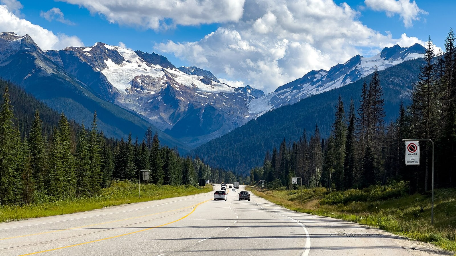 Mountain peaks and transport corridor at Rogers Pass in Glacier National Park